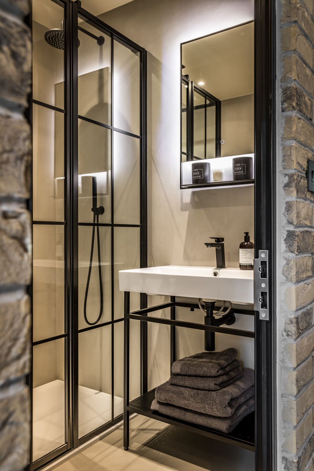 monochrome bathroom with modern lighting 