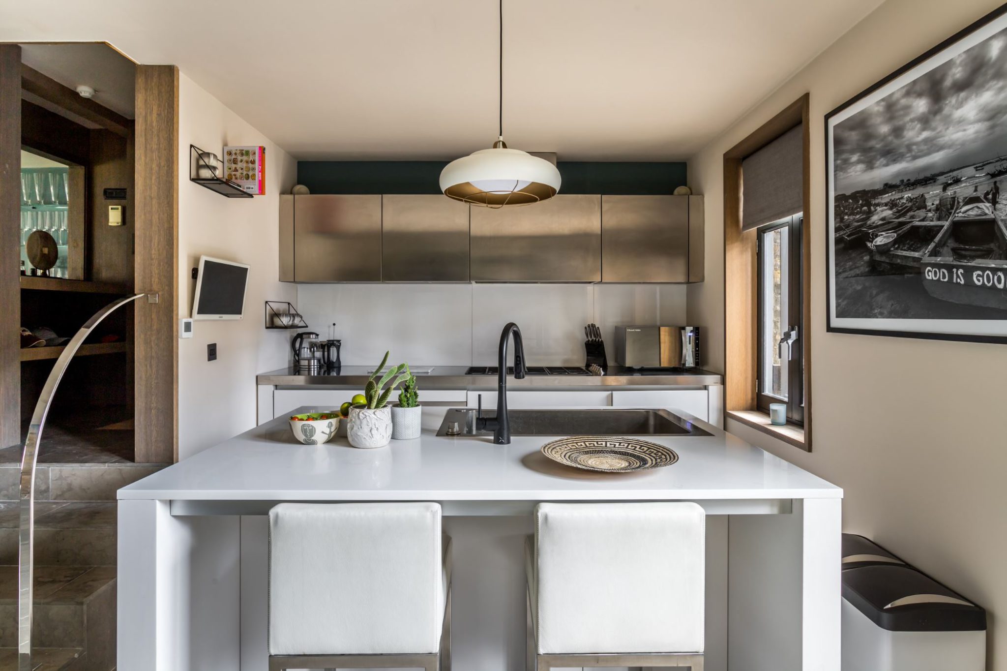 contemporary kitchen with statement lighting