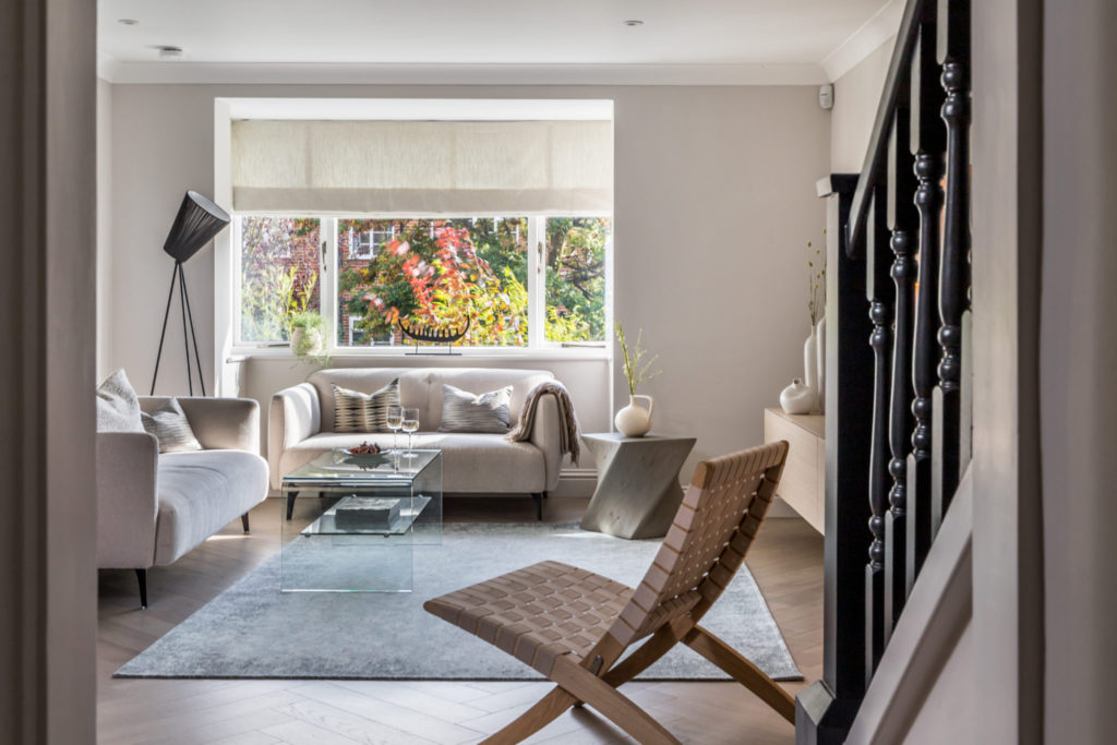 Wicker chair and wooden flooring details of Scandi style refurbishment