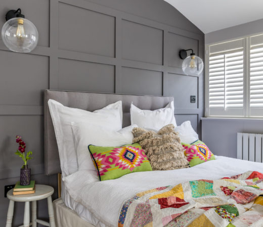 Grey Panelling and wall lights in bedroom