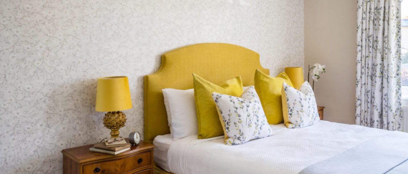 Putney Interior Design Project with yellow shaped headboard