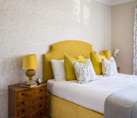 Putney Interior Design Project with yellow shaped headboard